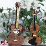 دکوری ساز چوبی سه نواز که در آن سازهای گیتار کلاسیک و گیتار الکتریک و ویالون وجود دارند
